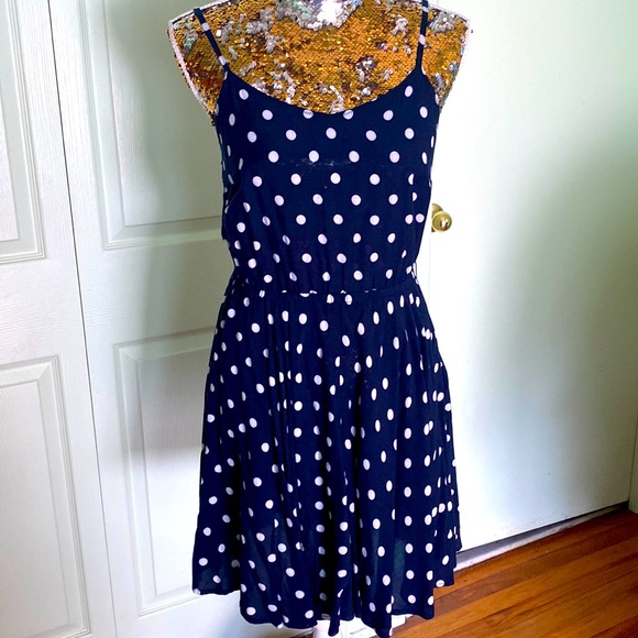 Adorable navy blue and white polkadot mini with Adjustable straps. - Picture 1 of 3